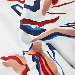 Macro shot showing detail of digital print on stretch fabric for men's swim shorts