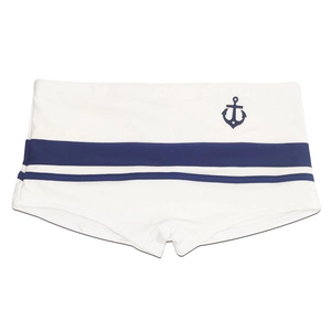 Detail of white men's swim trunks with navy blue stripes and a nautical anchor logo