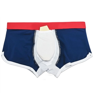 Men's navy color-block swim trunks featuring a protective front cup pad insert