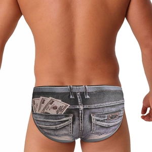 Detail of denim print men's swim briefs with 3D money pocket and brown brand tag back view