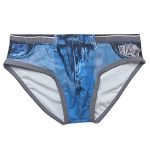 Detailed close-up of blue denim print on men's swim briefs with 3D digital patterns