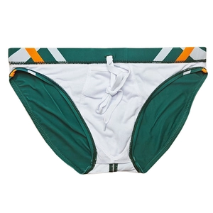 Détail du slip de bain vert foncé avec cordon blanc et rayures géométriques oranges
