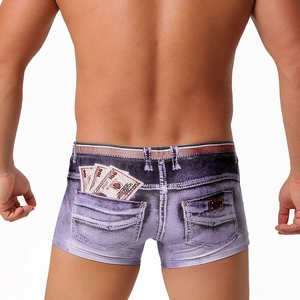 Detail of men's violet denim print swim trunks showing dollar bill pattern on back pocket