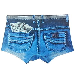 Macro detail of men's quick-dry denim print swim trunks with dollar and metal patch