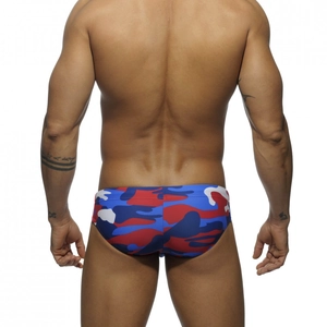 Rear view of men's low-rise swim briefs featuring a red, blue, and white camo print pattern