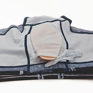 Detail of men's denim print swim trunks with internal pocket and removable padding cup