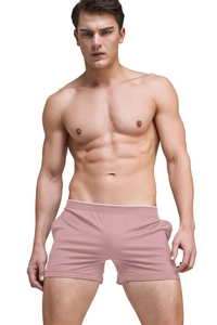 Close-up of pink modal lounge shorts for men featuring a soft elastic waistband