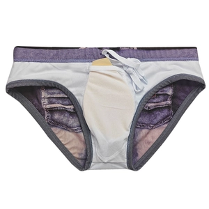 Detail of men's denim print swim briefs featuring internal pouch and white lining