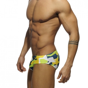 Men's low rise camo swim briefs in yellow and green camouflage pattern with elastic fit