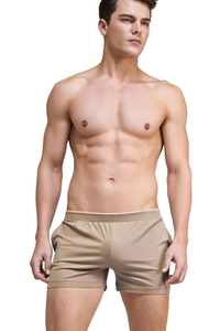 Close-up of khaki modal home shorts featuring a soft elastic waistband and premium fabric