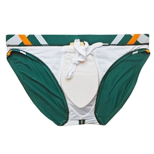 Detail view of green swim briefs featuring removable inner pad and adjustable drawstring