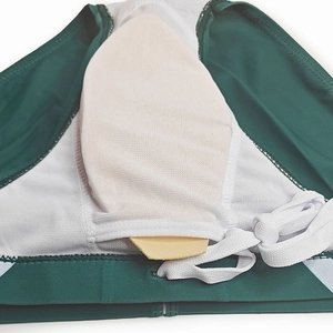 Detail of swim trunks with breathable white mesh lining and yellow removable protective cup pad