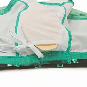 Macro detail of men's swim trunks with breathable mesh lining and adjustable white drawstring