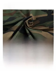 Macro shot of breathable camouflage mesh fabric detail on men's sexy bodysuit