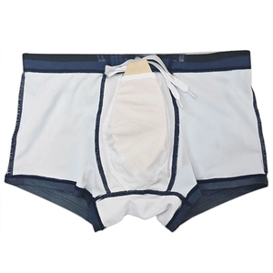 Close-up of men's swim trunks featuring built-in mesh pocket and removable protective cup