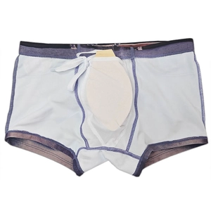 Detail of men's swimming trunks featuring internal white functional pocket and gradient waist