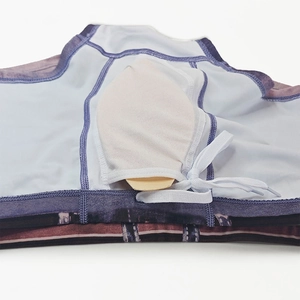 Detail view of men's swim shorts featuring inner mesh pocket, protective cup and drawstring