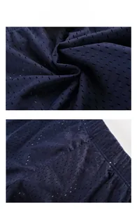 Detail display of breathable navy blue mesh fabric and elastic waistband stitching
