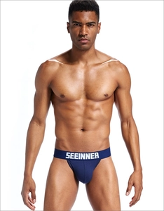 Vue de face du slip de sport bleu marine avec ceinture élastique griffée SEEINNER