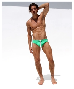 Detail of men's mint green swim briefs with white adjustable drawstring and elastic fabric