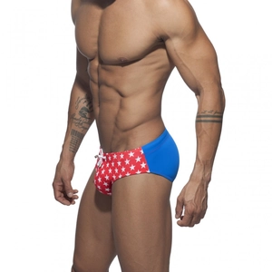 Men's star print swim briefs in red and blue color block with drawstring waist