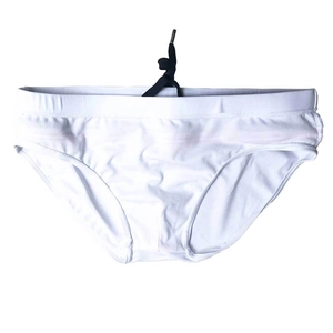 Detail of men's white nylon swim briefs featuring a black drawstring and elastic waistband