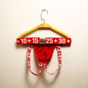 Detail of red cotton jockstrap with numerical print and MIBOER logo on waistband