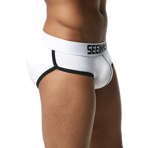 Close-up of men's white low-rise briefs with 3D cup and black SEEINNER logo waistband