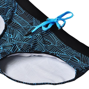 Detail of men's swim briefs showing blue drawstring and spider-web geometric pattern