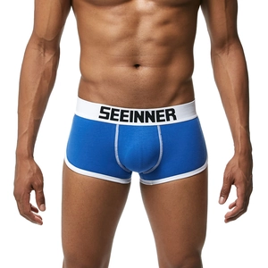 Dettaglio dei boxer blu da uomo con tasca ergonomica e fascia elastica bianca in vita