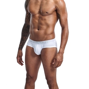 Detailed view of white cotton brief featuring elastic waistband with brand logo design