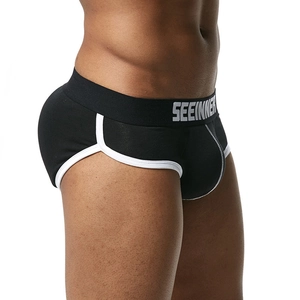 Detail view of men's black briefs featuring white contrast trim and SEEINNER waistband logo