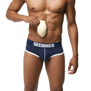 Men's navy blue briefs with 3D pouch design and removable butt-enhancing pad insert