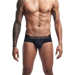Close-up of black cotton briefs with elastic wide waistband and u-convex design