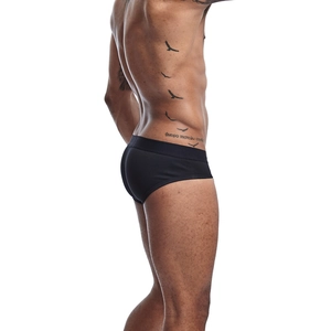 Detail view of men's black cotton briefs featuring an ergonomic U-pouch and elastic waistband