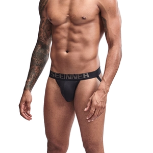 Détail d'un jockstrap noir en coton avec large ceinture élastique de marque