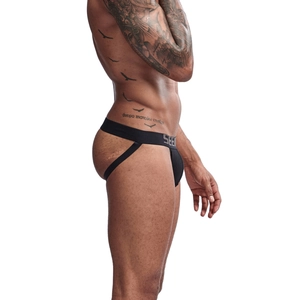 Vue latérale du jockstrap noir en coton pour homme avec large ceinture logotypée et bretelles
