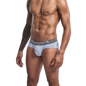 Close-up of low-rise cotton brief for men in light grey with elastic branded waistband