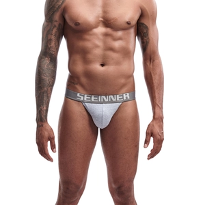 Detailed view of men's grey cotton jockstrap featuring a wide branded elastic waistband