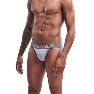 Detailed view of gray jockstrap with wide elastic waistband and contoured pouch support