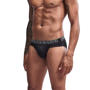 Close-up of black ribbed cotton briefs with white branded elastic waistband