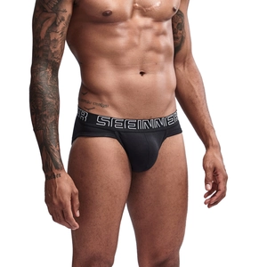 Detailed view of men's black cotton briefs with elastic branded logo waistband