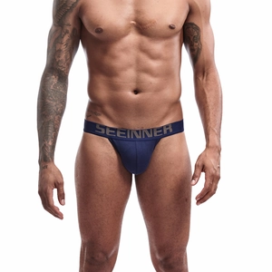 Detail of navy blue cotton briefs with a gold branded waistband and U-convex pouch design