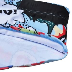 Detail of comic print swim trunks with elastic waistband and high-quality stitching