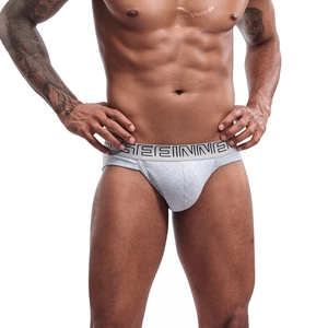 Close-up of light gray ribbed cotton men's briefs with branded elastic waistband