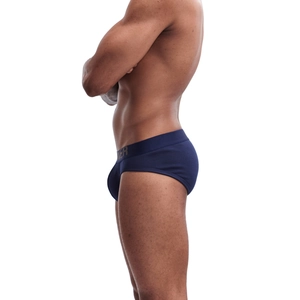 Detailed side view of navy blue cotton briefs with a gold elastic branded waistband