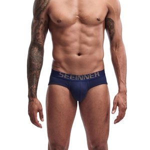 Men's solid navy blue low-rise cotton briefs with wide elastic waistband and u-convex pouch