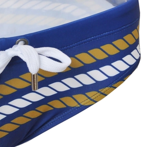 Detail of nautical print swim briefs showing the navy fabric with rope pattern and drawstring