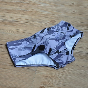 Men's blue camouflage swim trunks with square cut design and elastic quick-dry fabric