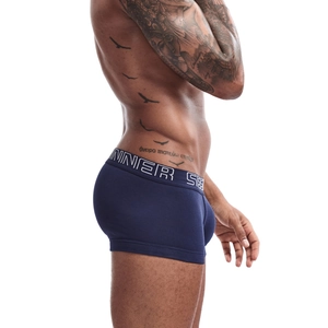 Detailed side view of navy blue cotton boxer briefs with white lettered elastic waistband
